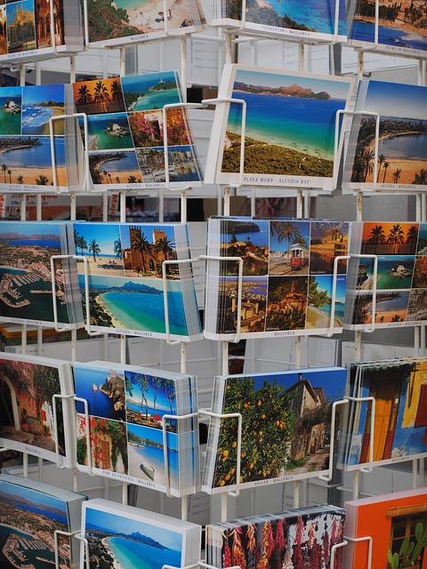 A vibrant array of postcards showcasing beautiful coastal landscapes, featuring beaches, palm trees, and serene waters in various locations.